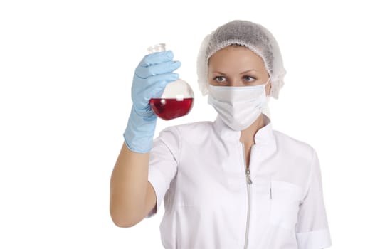 young woman scientist , mixed the liquid in the tube