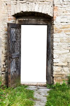 An image of open iron door of a fortres