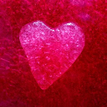 Stock photo: an image of red heart on a purple background