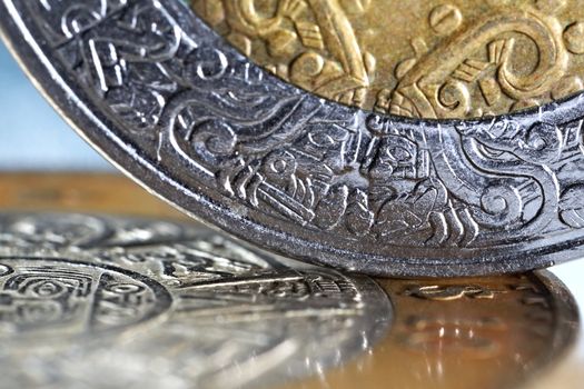 macro of mexican coins with a selective focus