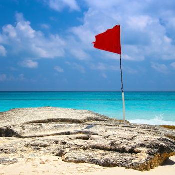 red flag on the beach