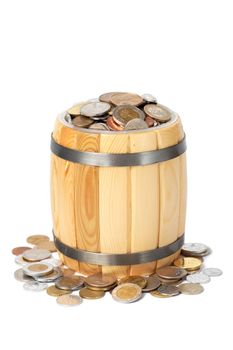 overflowing barrel with various coins