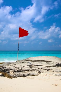 red flag on the beach