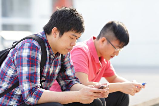 young man looking on cellphone