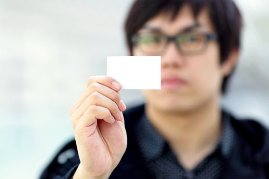 blank business card in hand