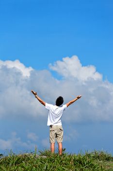 Man holding arms up