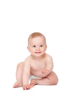 smiling baby sitting on the floor