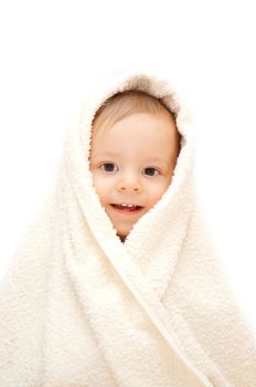 smiling baby in towel