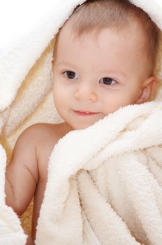 smiling baby in towel