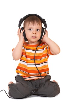 smiling baby with headphones