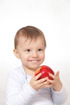 baby with red apple