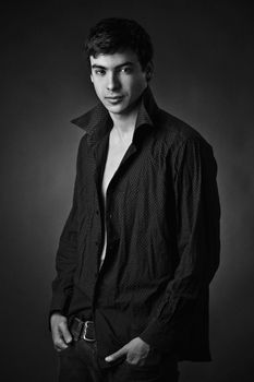 b&w portrait of a young man with unbuttoned shirt