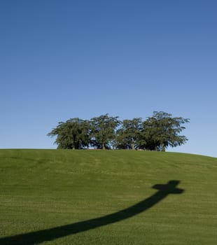 Cross shadow in the grass