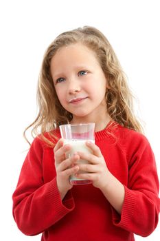 Portrait of cute little girl holding glass of milk. Isolated on white background.