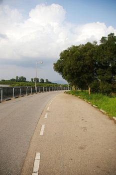 Road in blue sky