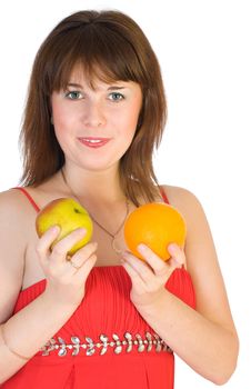 girl with orange and apple in hands isolated on white