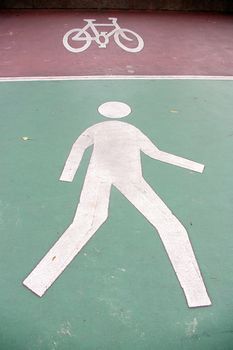 Bicycle and human sign on street