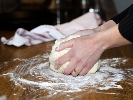 Close up of a woman Kneading Dough