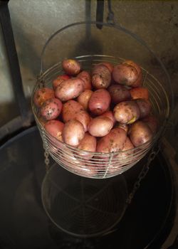 Large group of potatoes in a basket