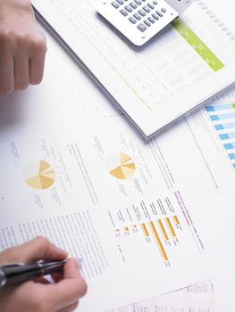 Market Analyze - pen and numbers on paper