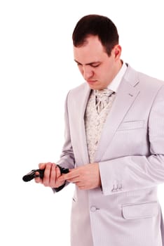 man in white suit reload the gun, white background