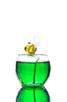 green gel candle isolated on white background