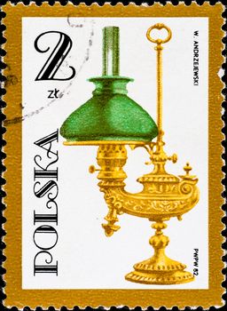 POLAND - CIRCA 1982: postage stamp shows vintage kerosene lamp, circa 1982