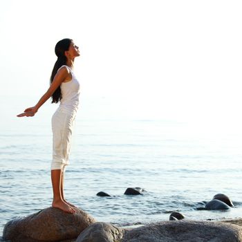 meditation on ocean sand beach