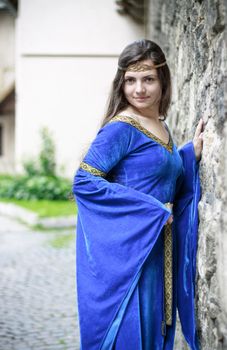 medieval princess on street of old town