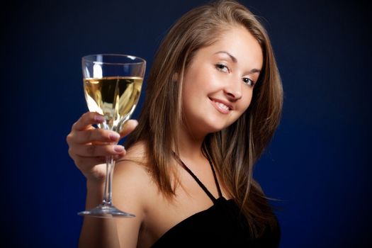 beautiful girl with glass of wine, focus on face