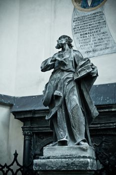 statue with book near Latin Cathedral, Lviv, Ukraine