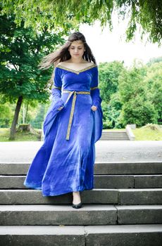 beautiful medieval woman down the stairs