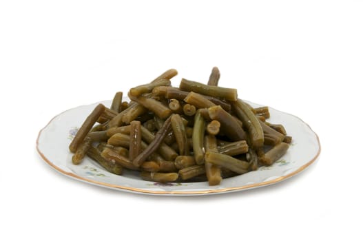 dish a spicy salad of asparagus on a white background