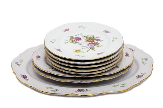 set of beautiful ware plates on a white background