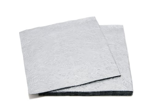 beautiful silver table napkins on white background