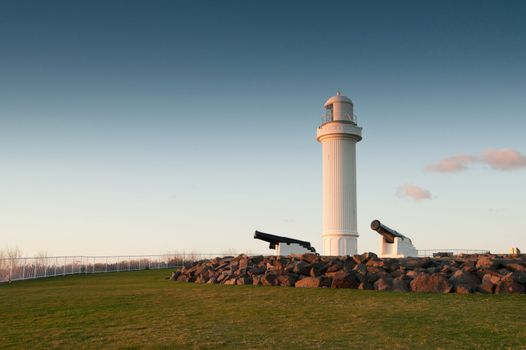 lighthouse and cannons in the morning at wollongong