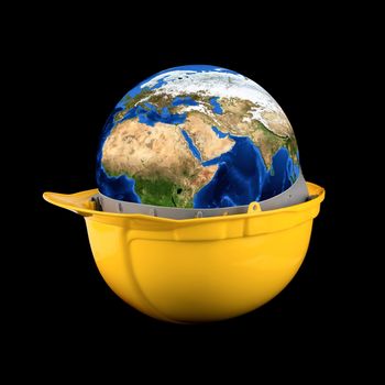 Yellow helmet with earth planet isolated on a black background