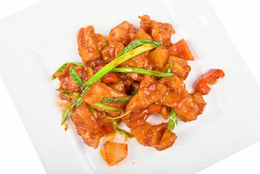 Roasted Beef at sour-sweet sauce on a white background
