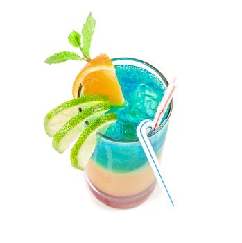 Alcoholic cocktail with lime, orange and mint decorated  isolated on white background
