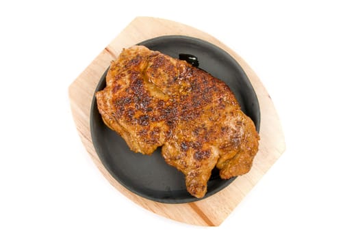 delicious grilled chicken on a pan isolated over white background