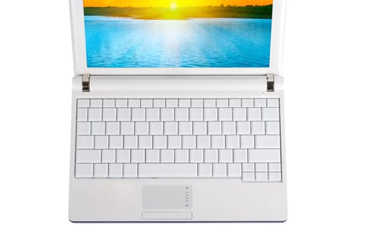 White Laptop with empty keys and nature image at the screen isolated on a white background
