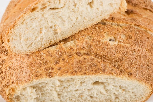 Brown tasty bread isolated on a white background
