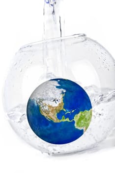 earth in water dropped isolated on a white. inundation concept