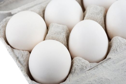 Eggs at the box isolated on a white background