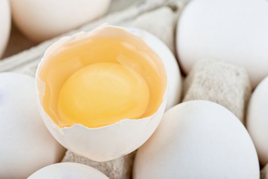 Eggs closeup with one egg is broken