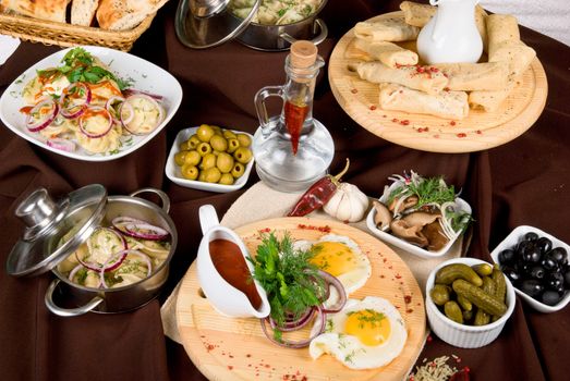 Many food dishes on the table. close up.