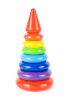Plastic toy pyramid on a white background