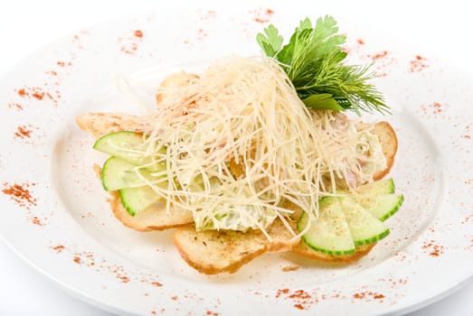 Tasty Salad dish with dried crust, vegetables and cheese