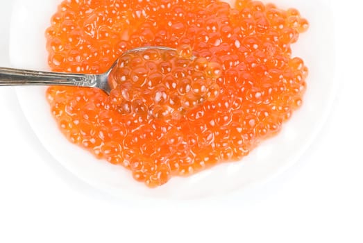 red caviar with spoon on a white background