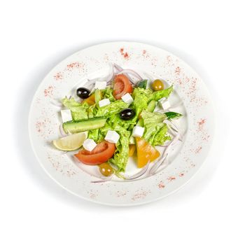 Greece salad dish isolated on a white background